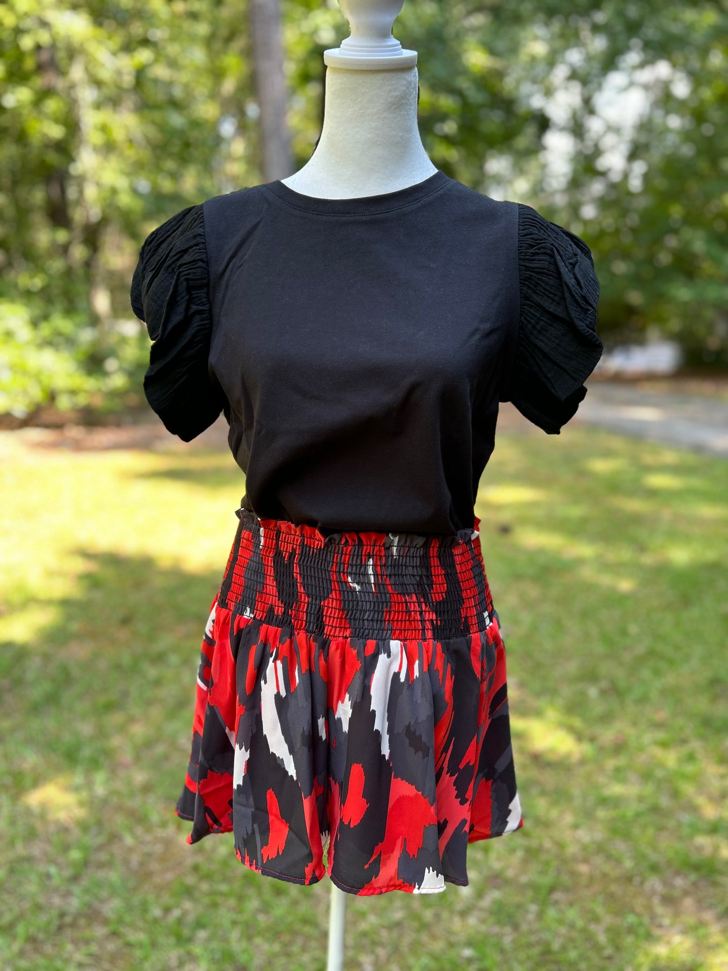 Red + black abstract shorts