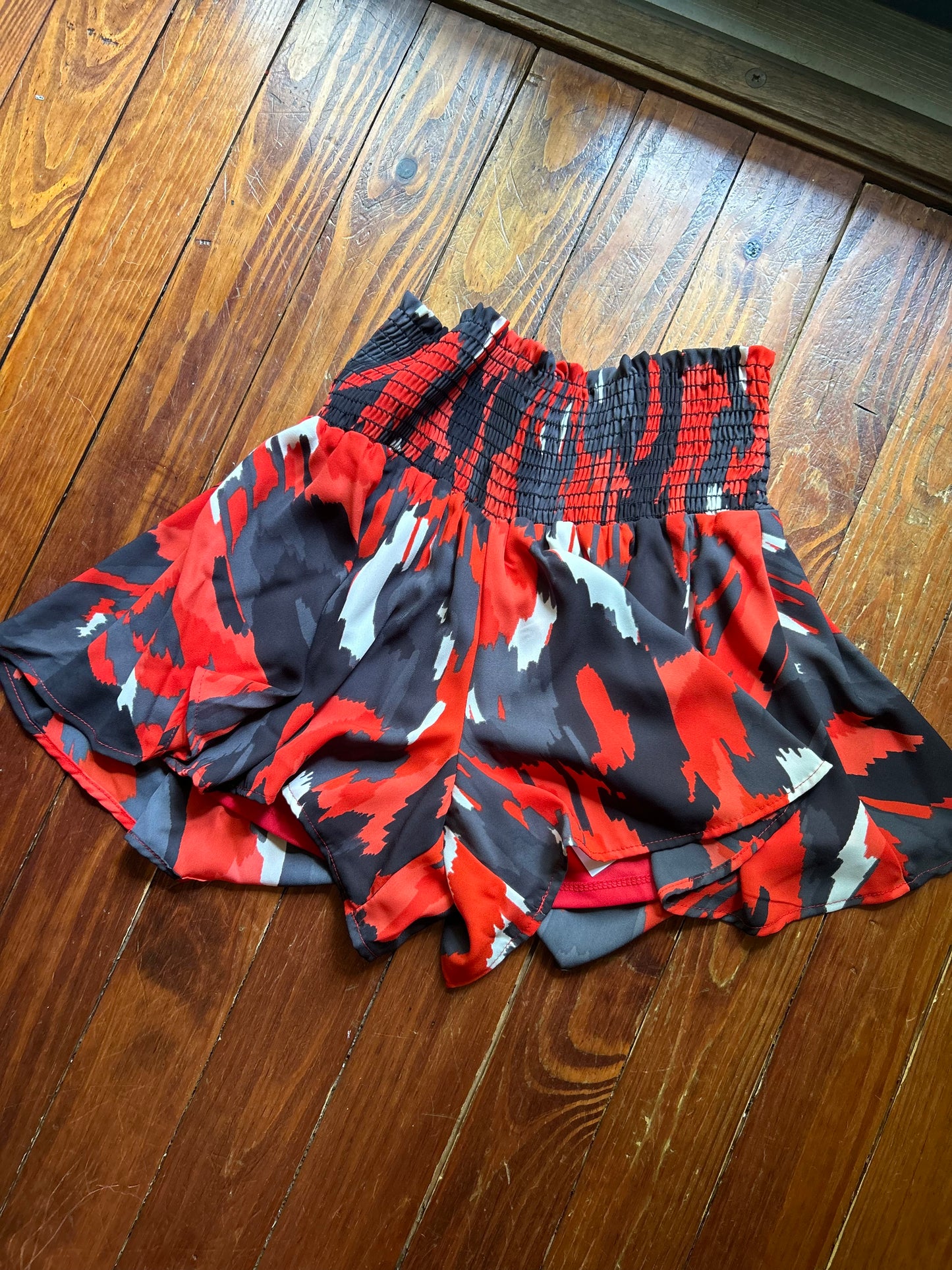 Red + black abstract shorts