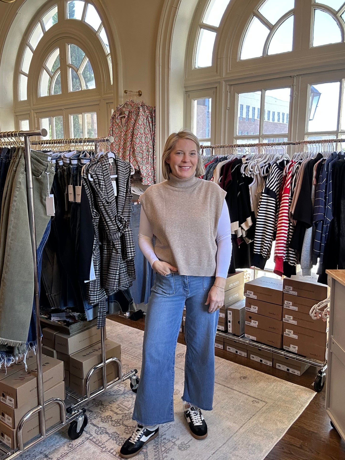 High low sleeveless turtleneck sweater