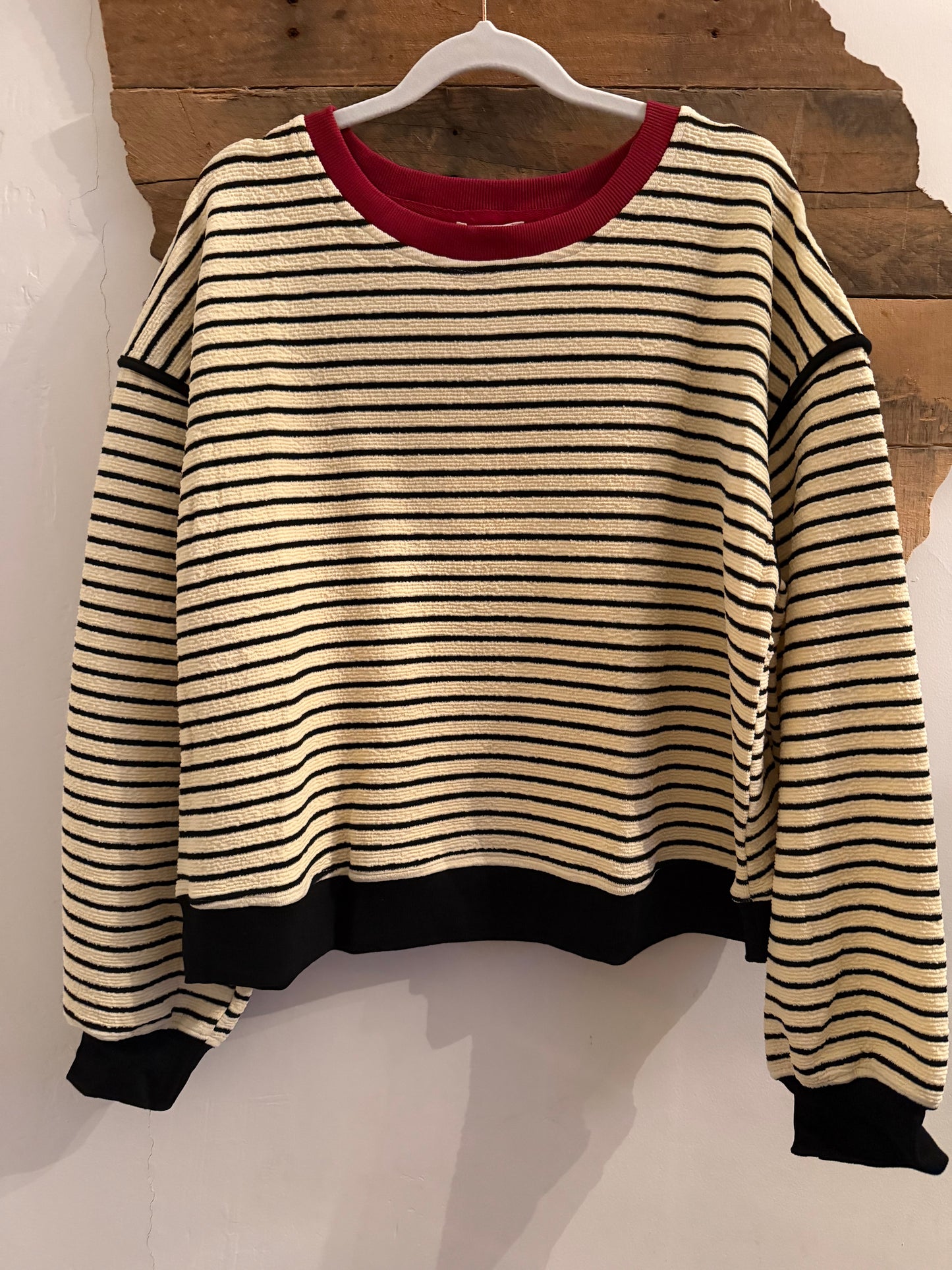 Striped sweater with red collar