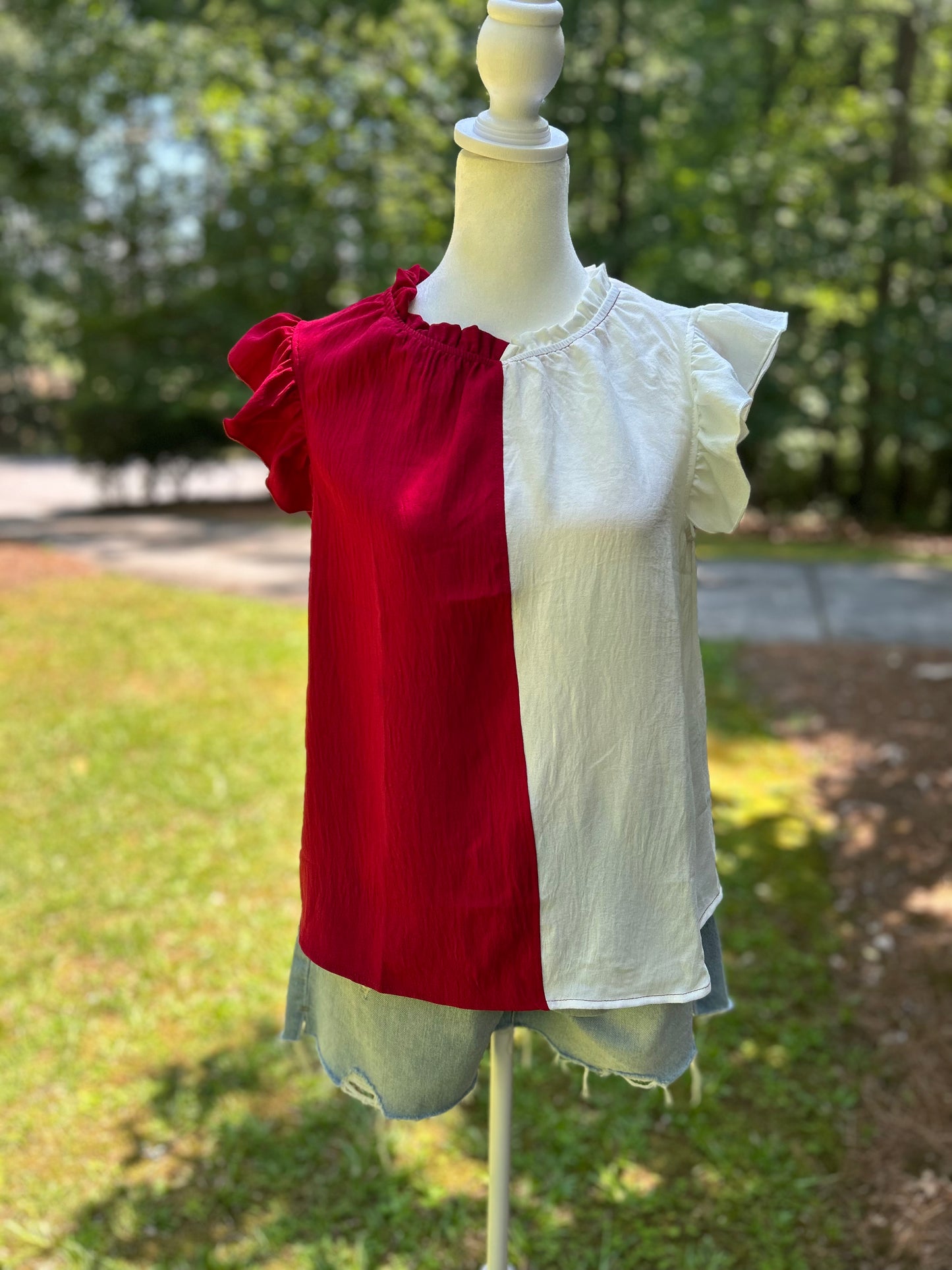 Crimson and white colorblock top.