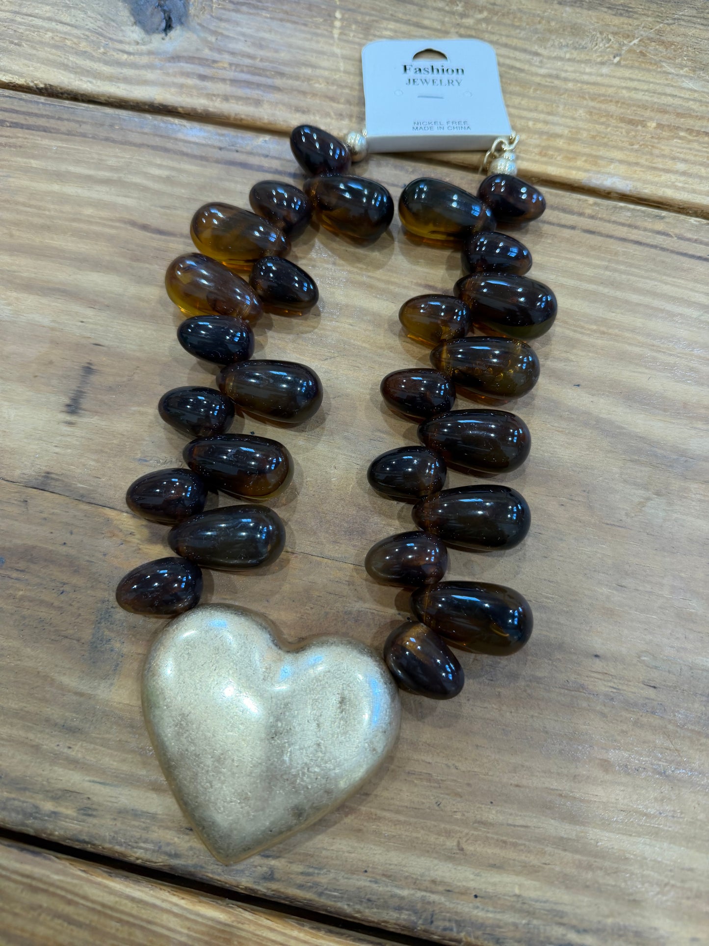 Tortoise and heart necklace