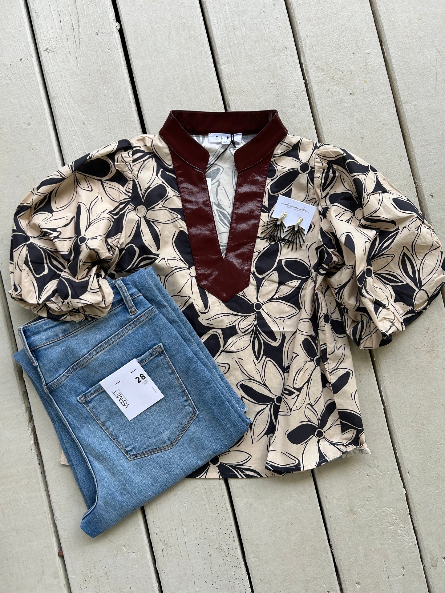 Faux leather trim detail, puff sleeves and floral print top.