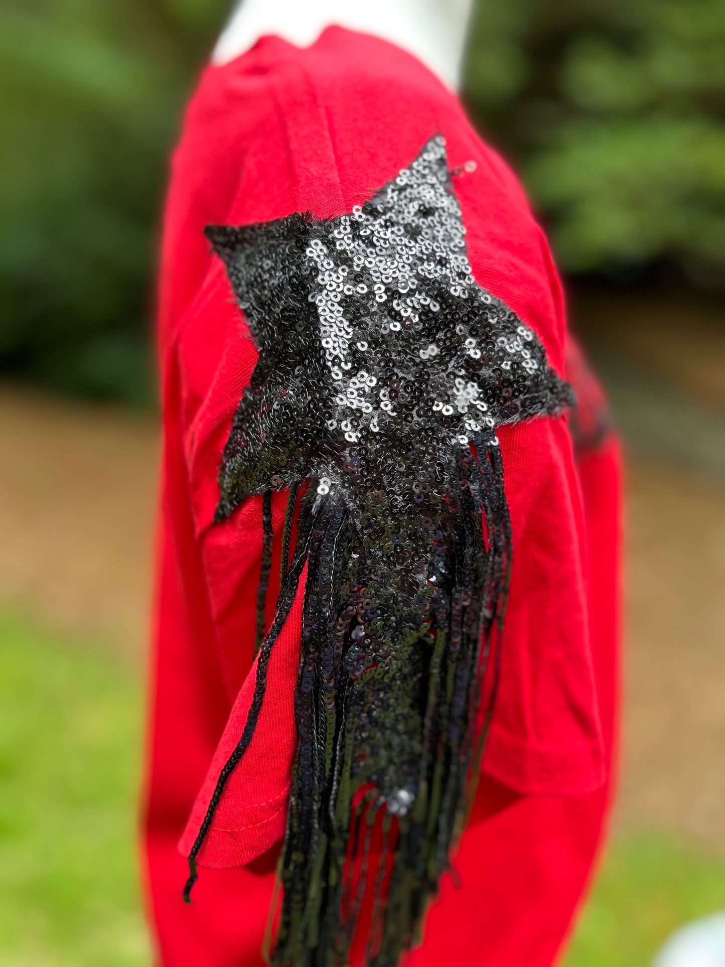 Black sequin star detail on Georgia gameday top.