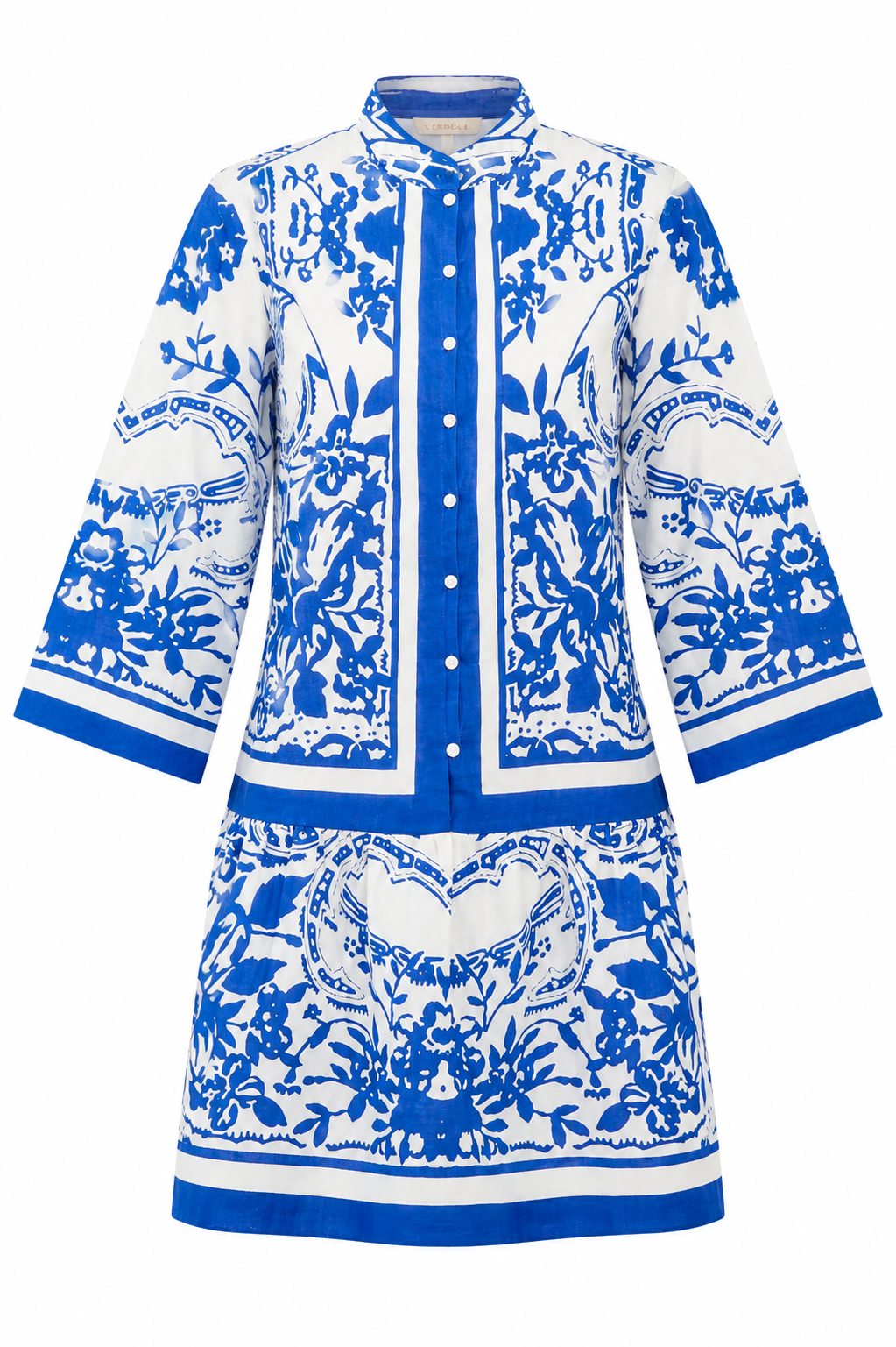 Blue and white patterned dress on a white background