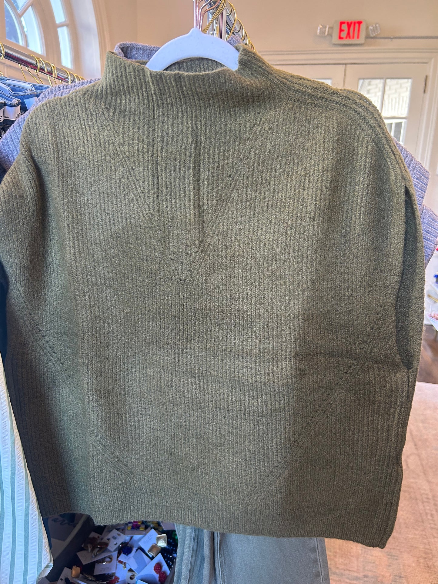 Sleeveless mock neck knit top