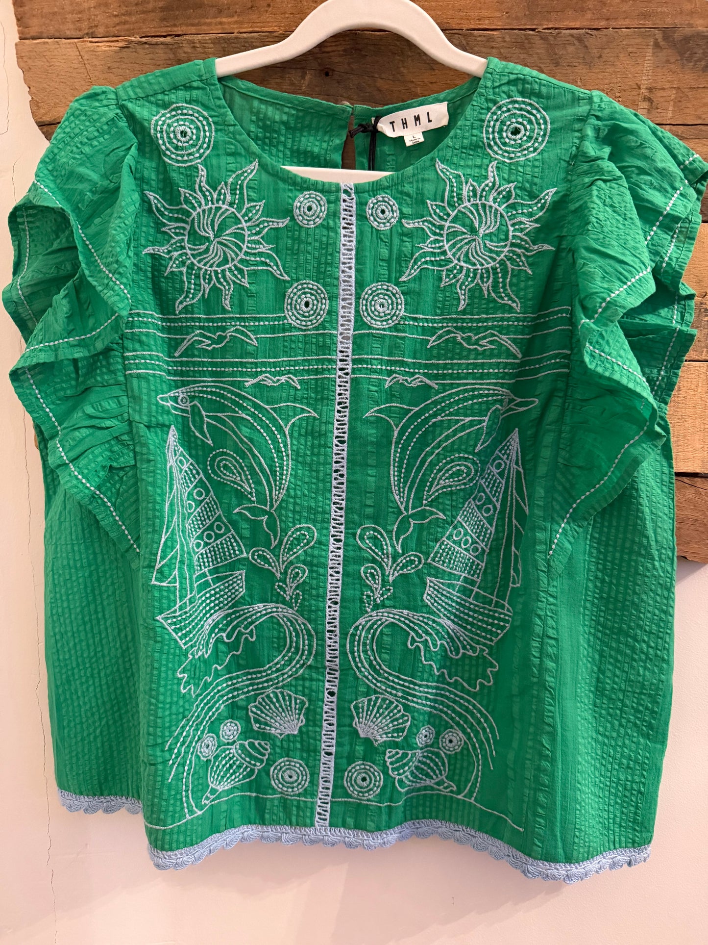 Ruffle sleeve embroidery detail top