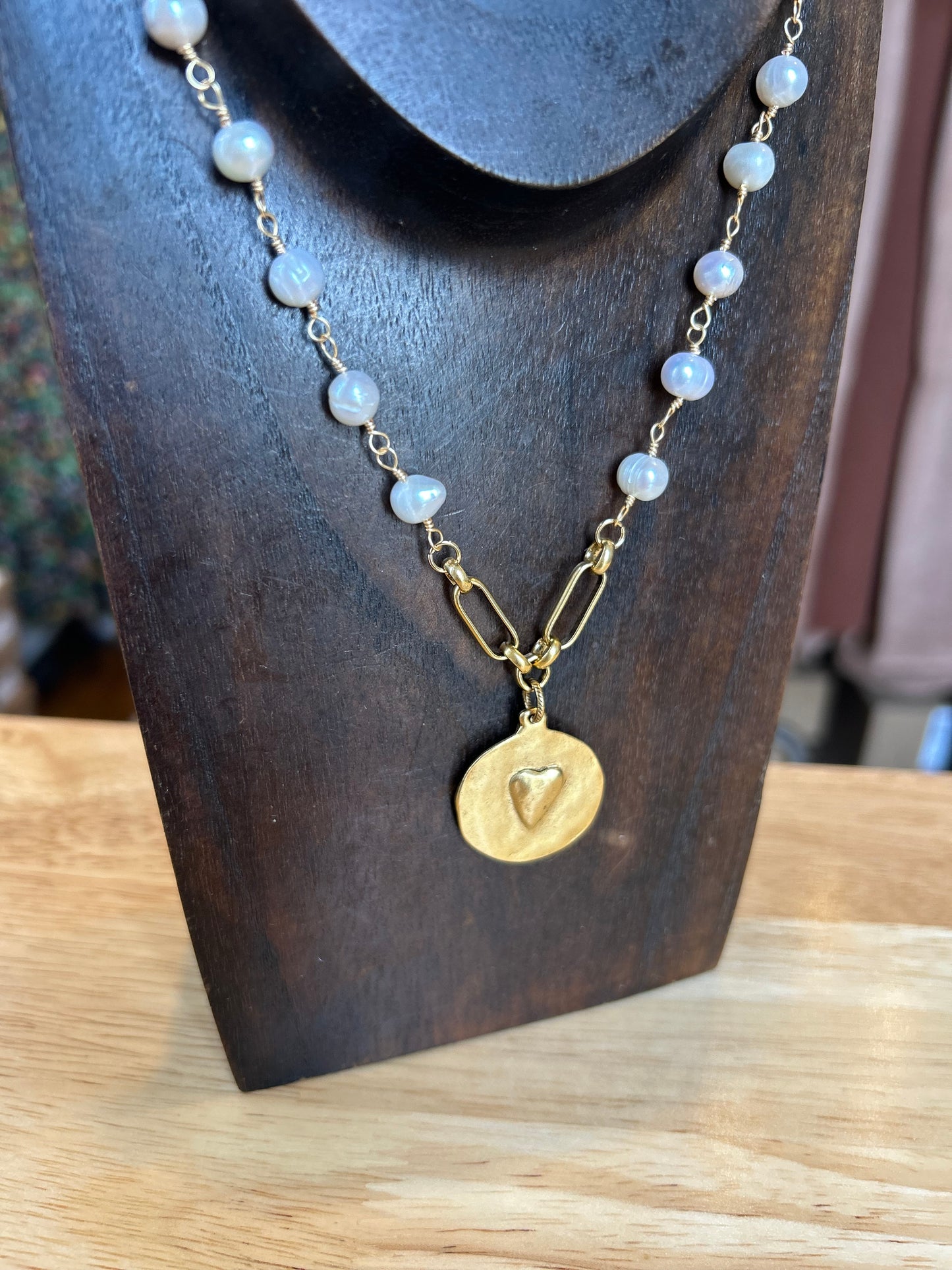 Pearl chain necklace with double sided charm