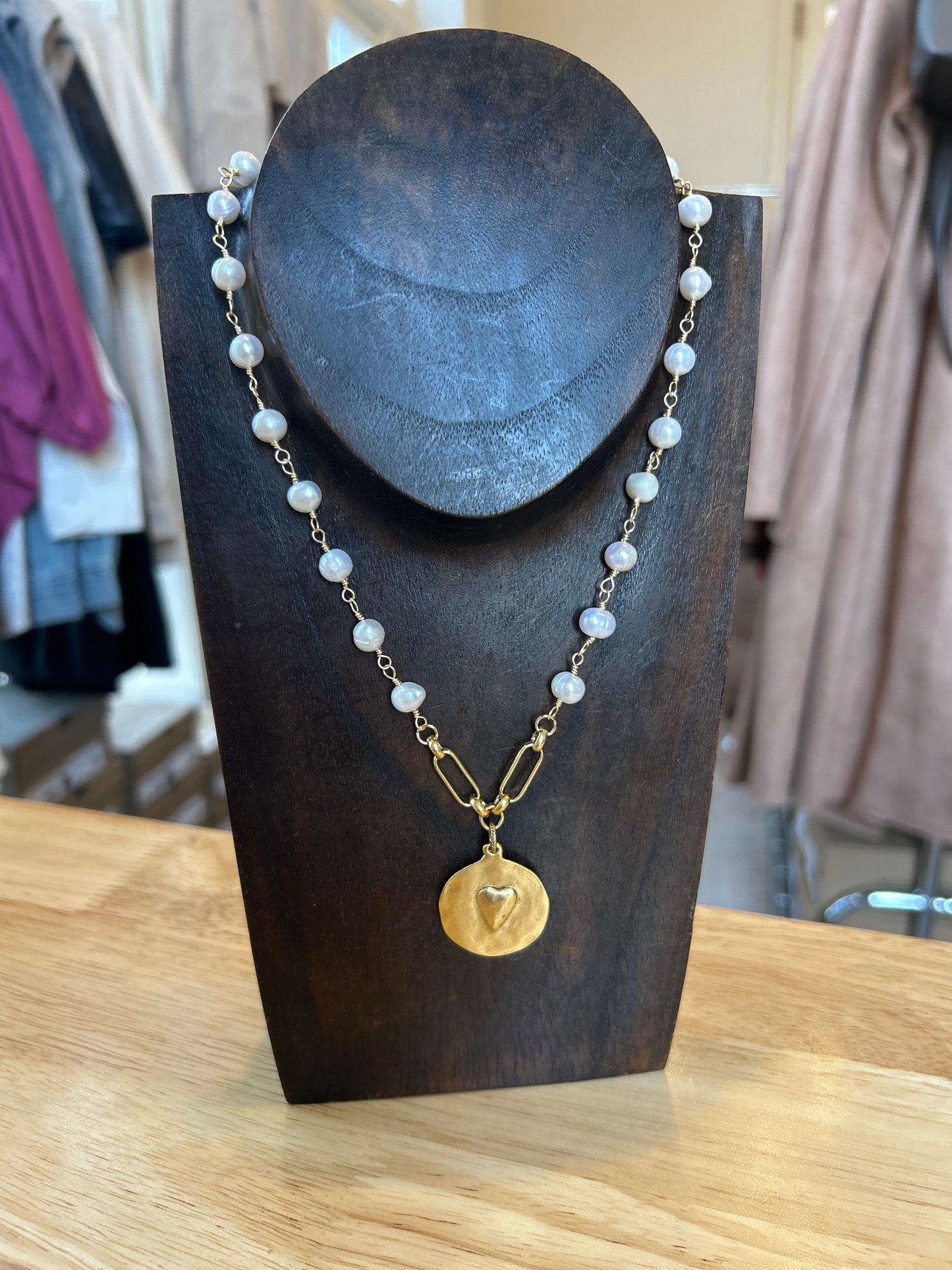 Pearl chain necklace with double sided charm