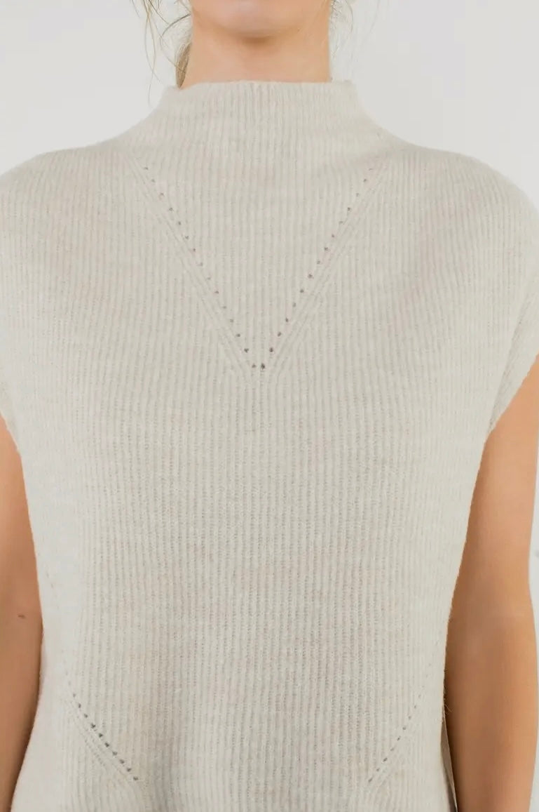 Sleeveless mock neck knit top