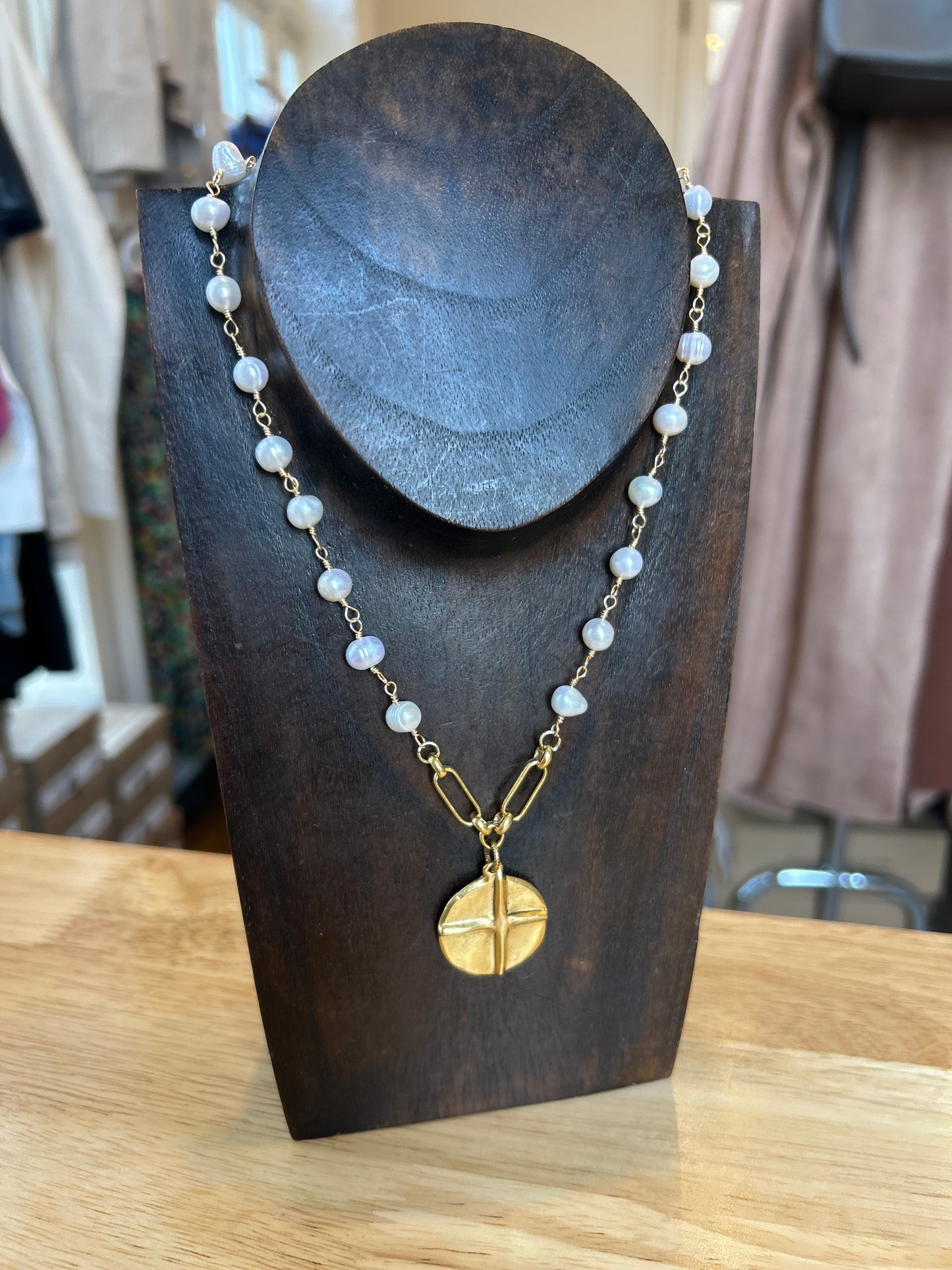 Pearl chain necklace with double sided charm