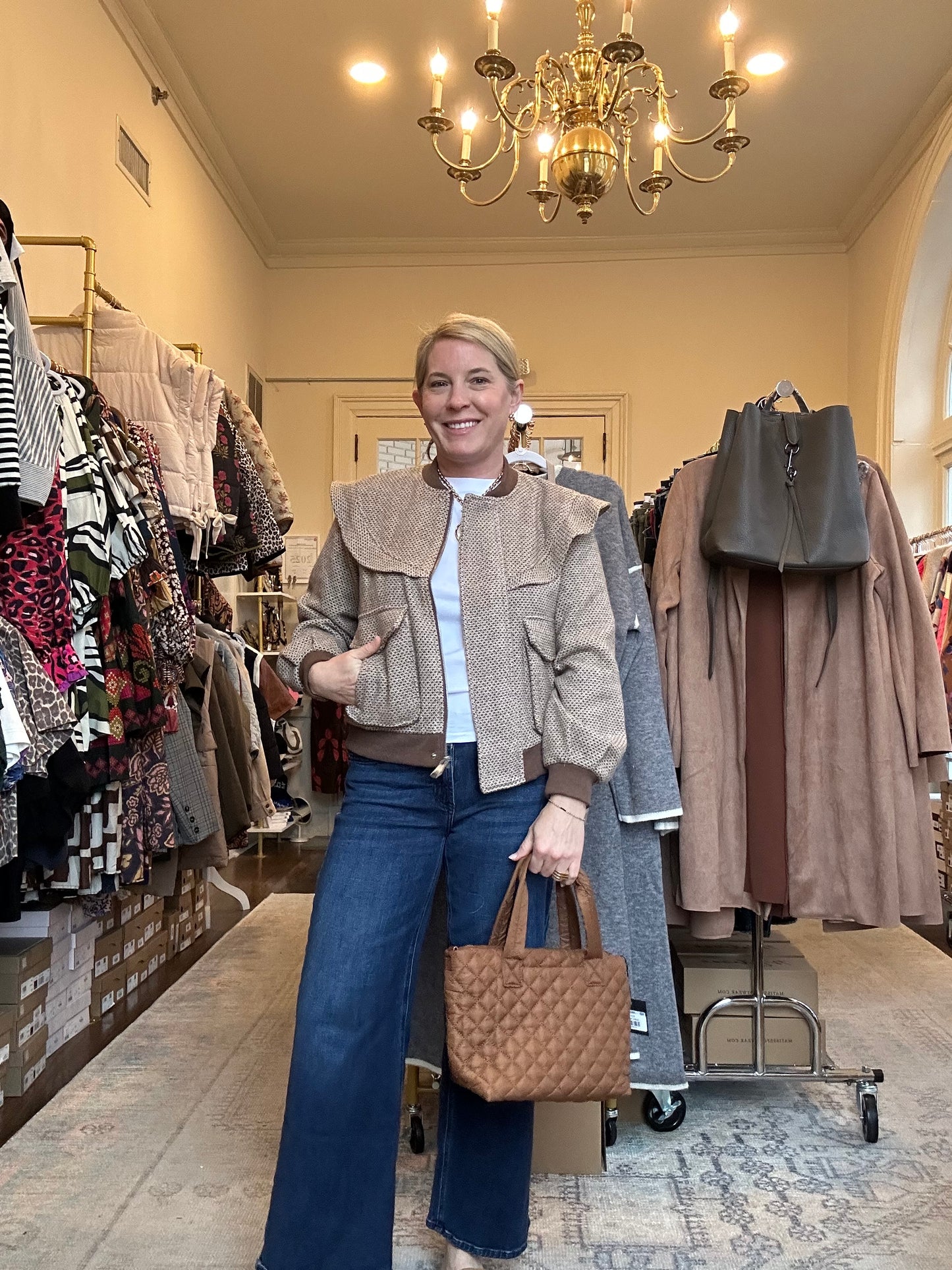 Perforated Pattern Ruffle Detail
Bomber Jacket