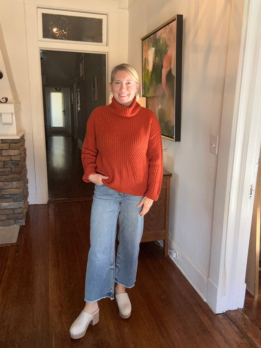 Cross back turtleneck sweater