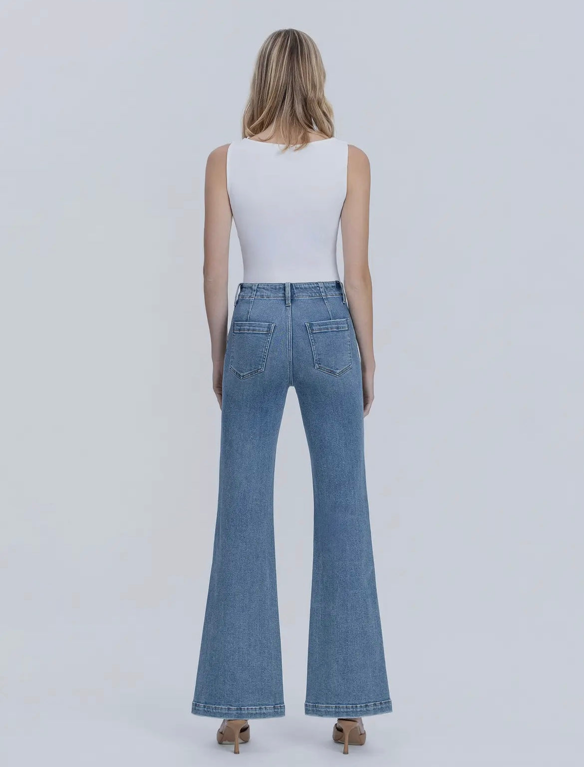 High Rise Medium Wash Slit Hem
Easy Flare Jeans