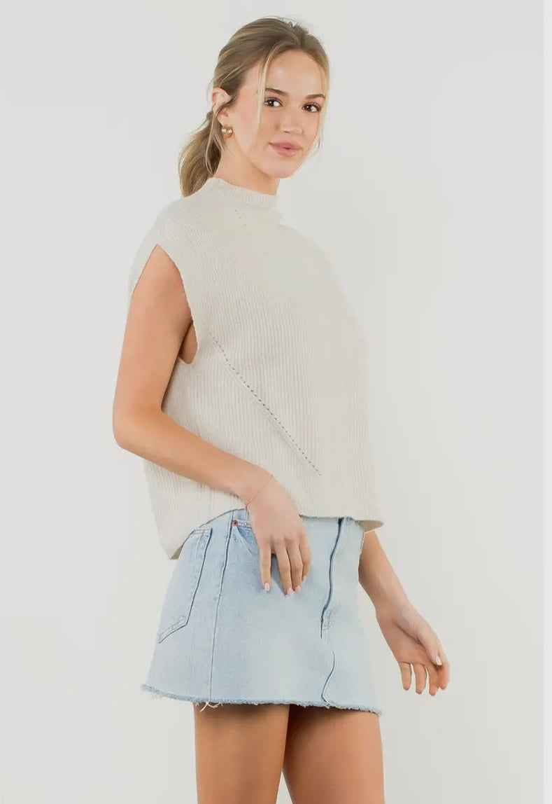Sleeveless mock neck knit top