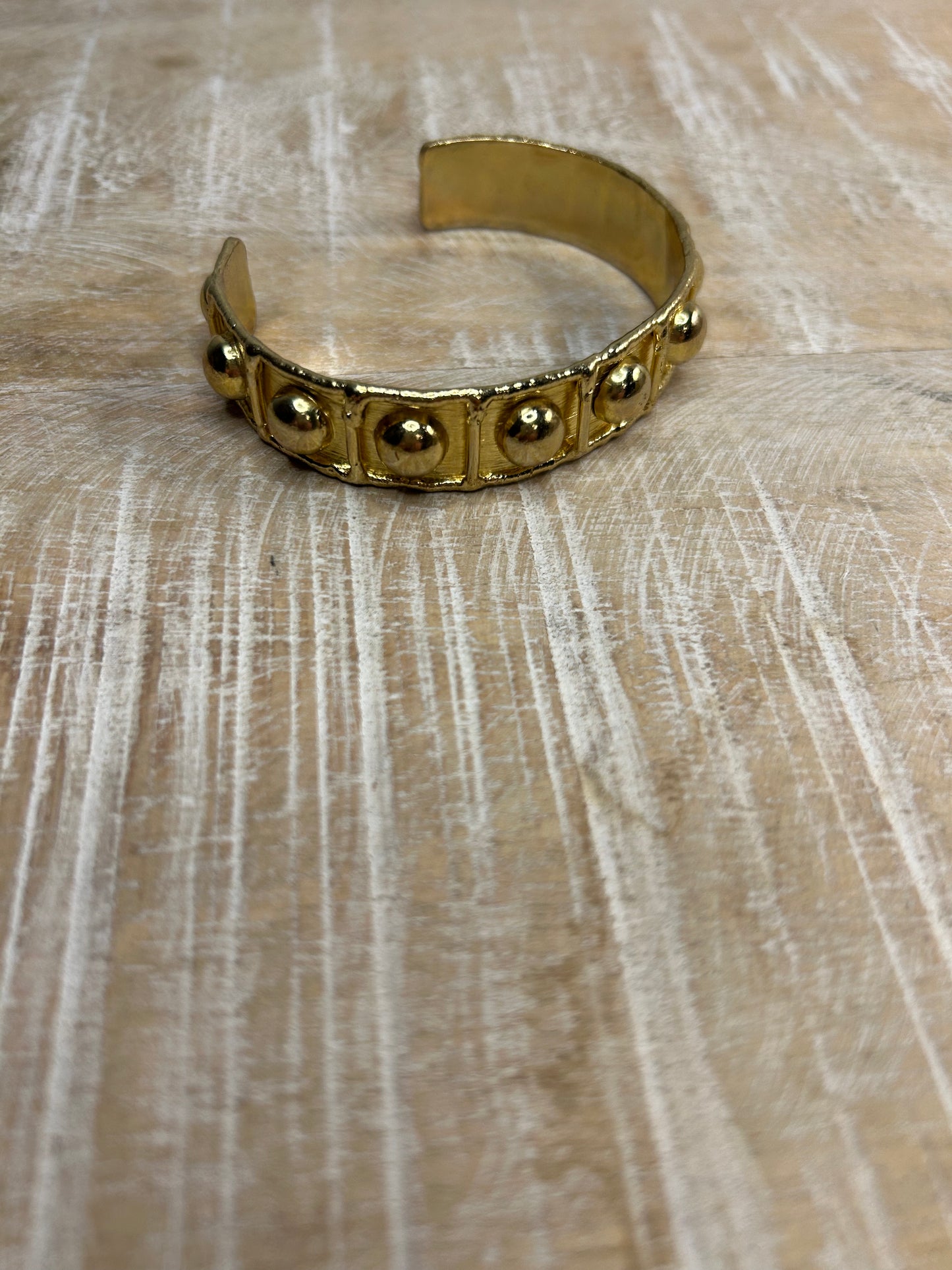 Golden dot cuff