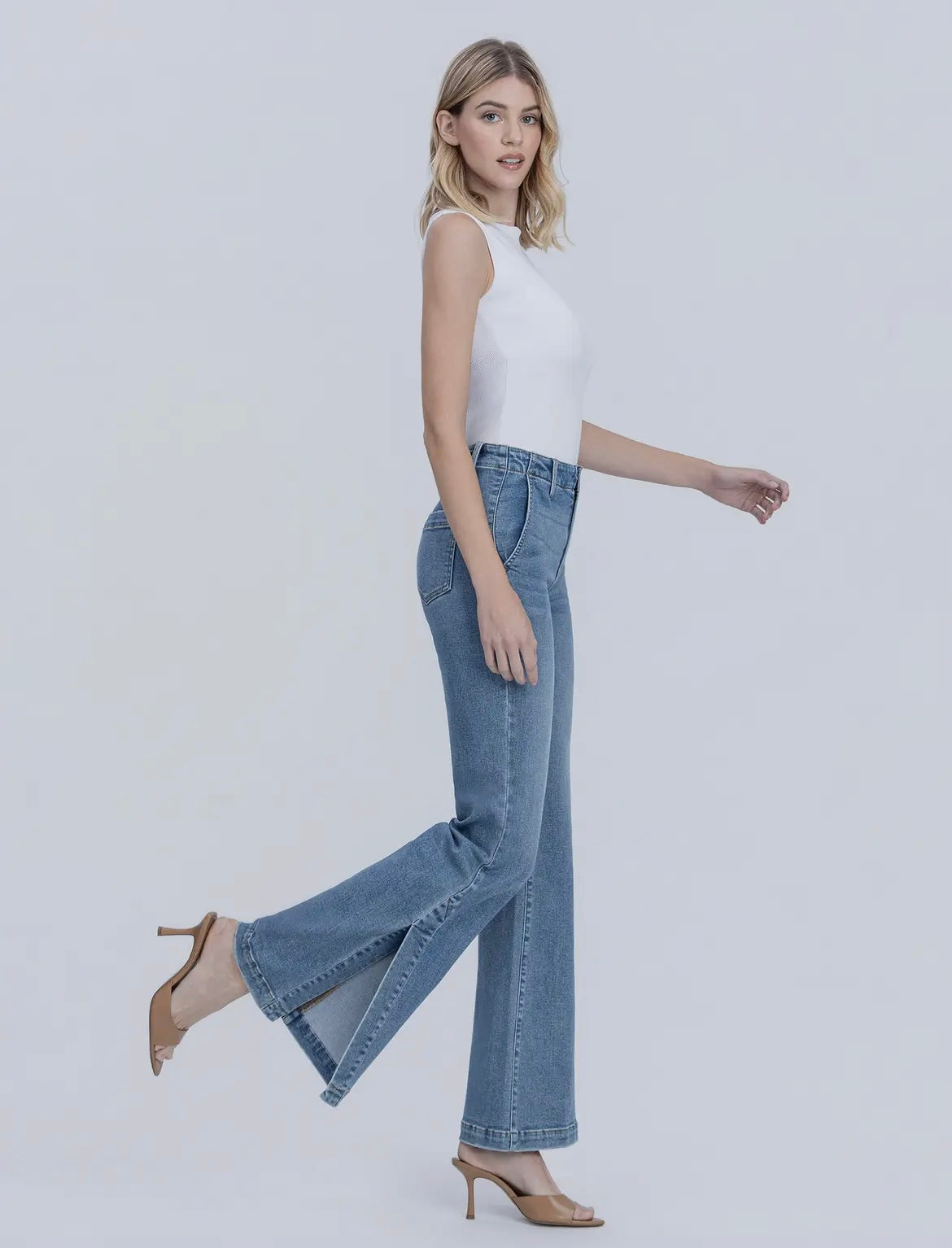 High Rise Medium Wash Slit Hem
Easy Flare Jeans