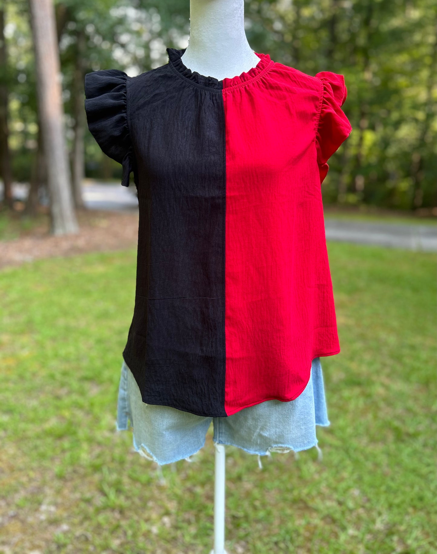 Black and Red colorblock ruffle neck and ruffle sleeve top. 