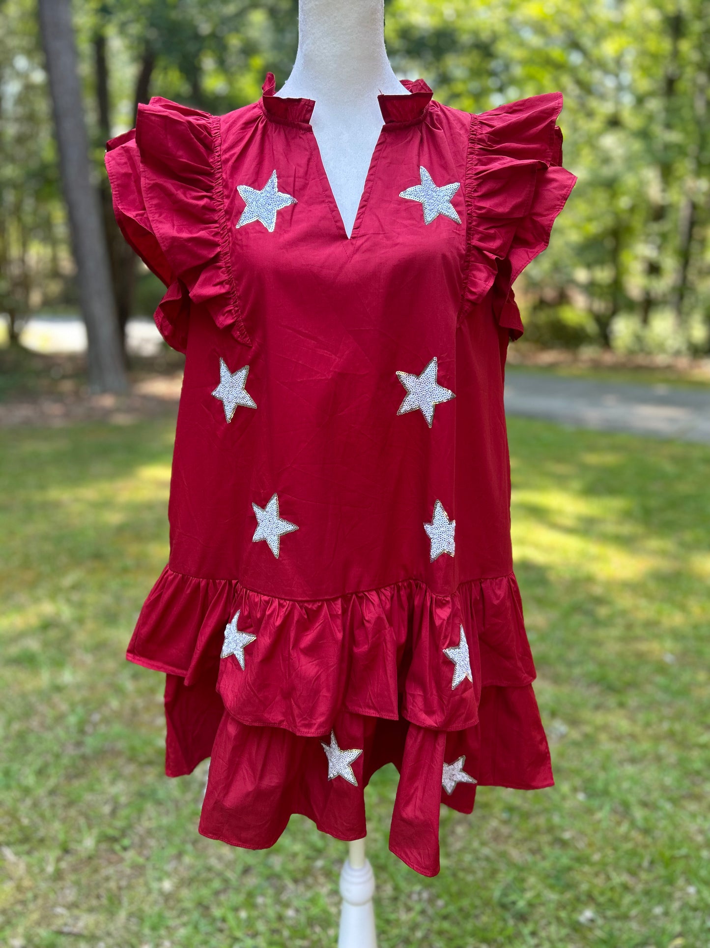 Crimson ruffled dress with sequin white stars