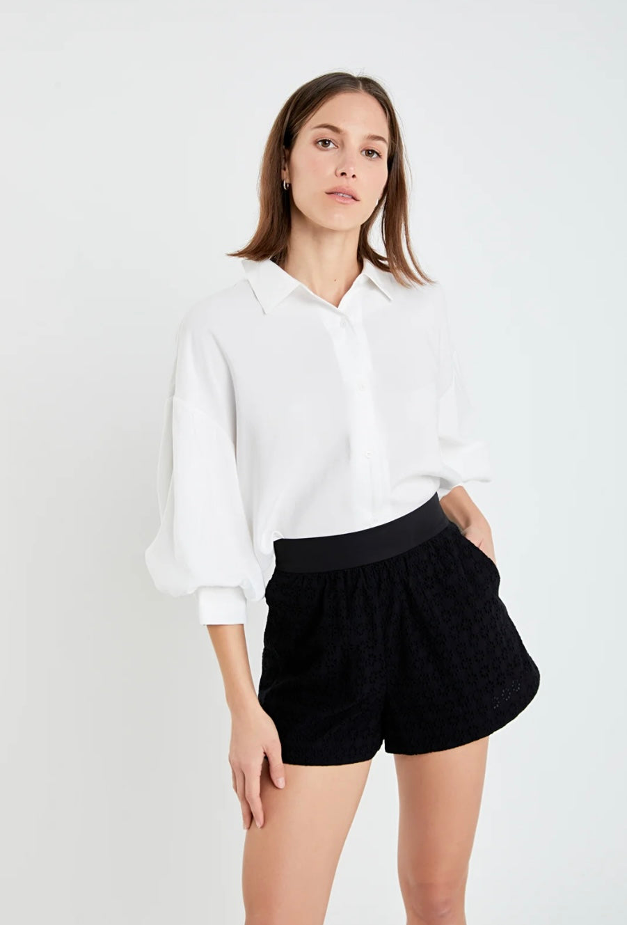 White balloon sleeve blouse. Button up with collar. 