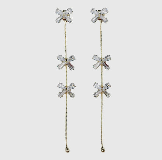 Diamond Bow Gold Duster
Drop Earrings