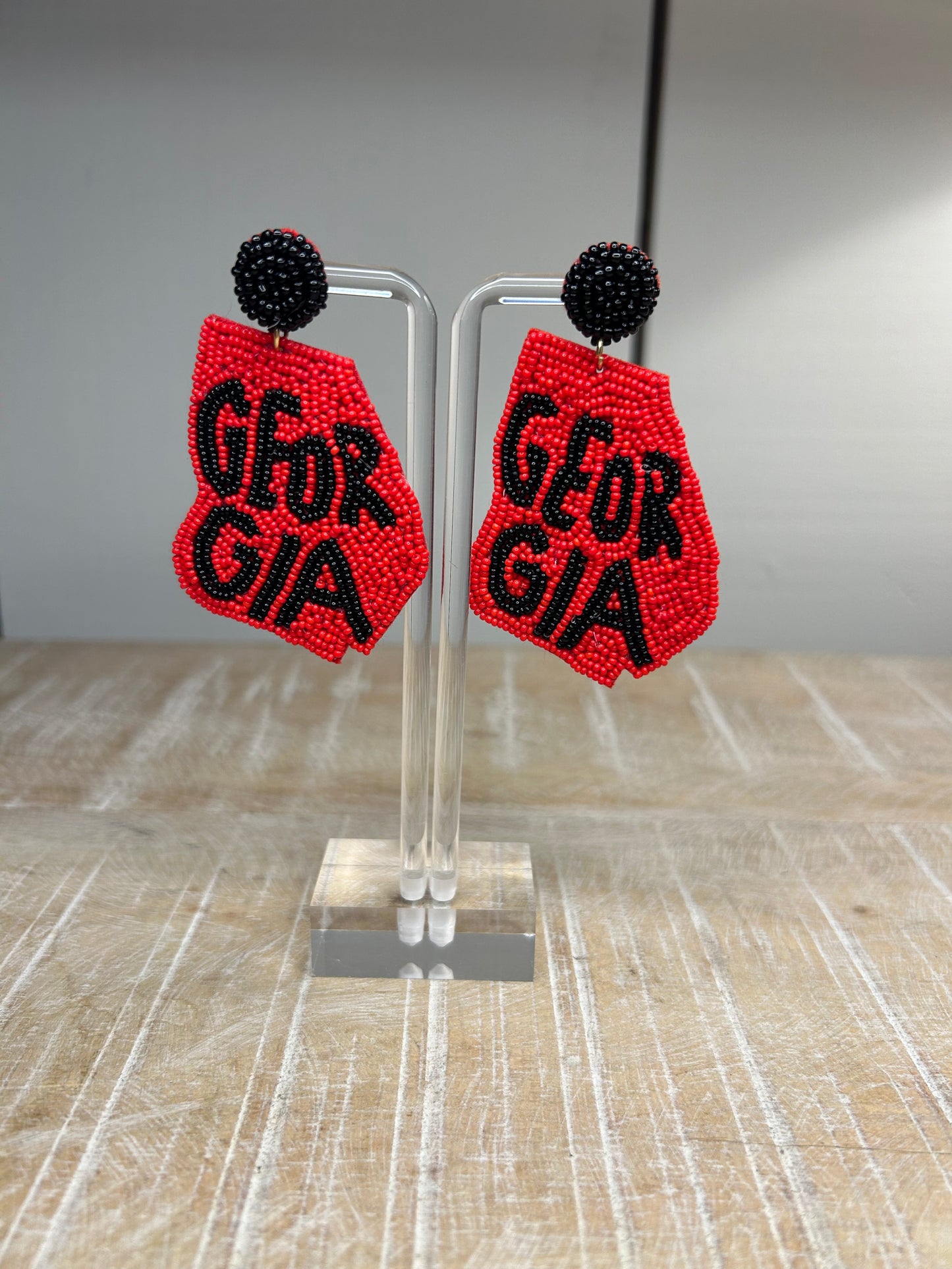 Lightweight, State of Georgia earrings. Red background with black letters spelling out Georgia