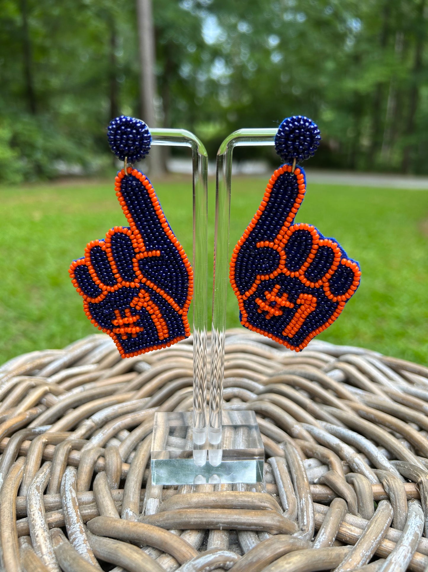 Lightweight, beaded earrings. Number #1 finger in navy and orange. 