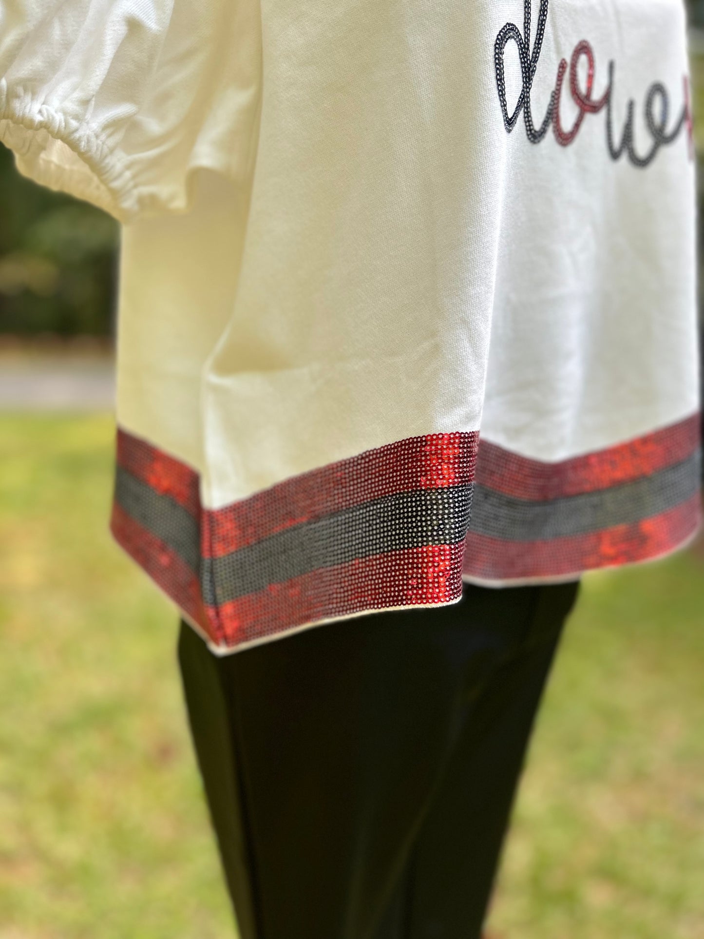 Red and black sequin hem detail