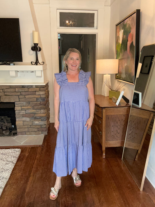 Blue and white striped dress by THML. Maxi length with ruffled shoulder straps. 