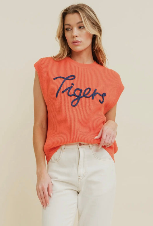 Orange sleeveless sweater with Tigers embroidered in navy. 