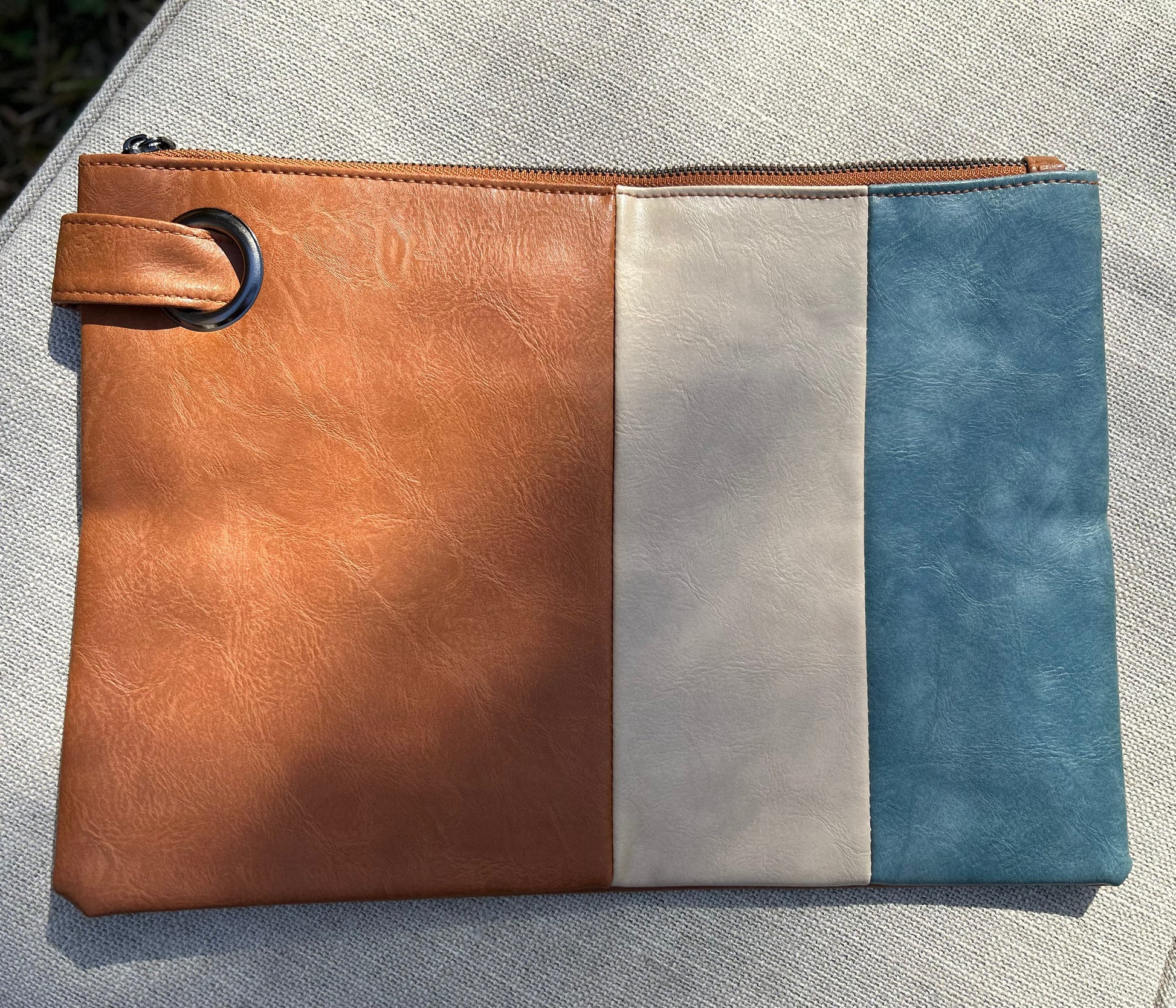 striped clutch purse